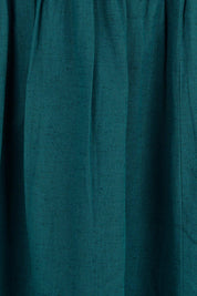 Product shot of the Belle Cotton Shirred Bodice Dress in colour Deepocean (Green), detail