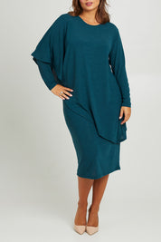 Model Monique wearing size 14 of the Belle Crew Neck Overlay Knit Midi Dress in colour Petrol (Blue), from the front, cropped image