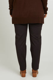 Model Monique wearing size 14 of the Belle Printed Ponte Pull On Pant in colour Ochrenavy (Blue), from the back