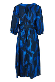 Product shot of the Belle Puff Sleeve Printed  Cotton Wrap Dress in colour Trioofblue (Blue), from the back