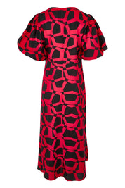 Product shot of the Belle Printed Twist Knot Detail Cotton Dress in colour Blackrasp (Black), from the back