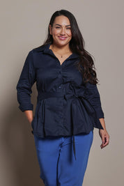 Model Ashleigh wearing size 16 of the Belle Tie Waist Cotton Shirt in colour Navy (Blue), from the front, cropped image