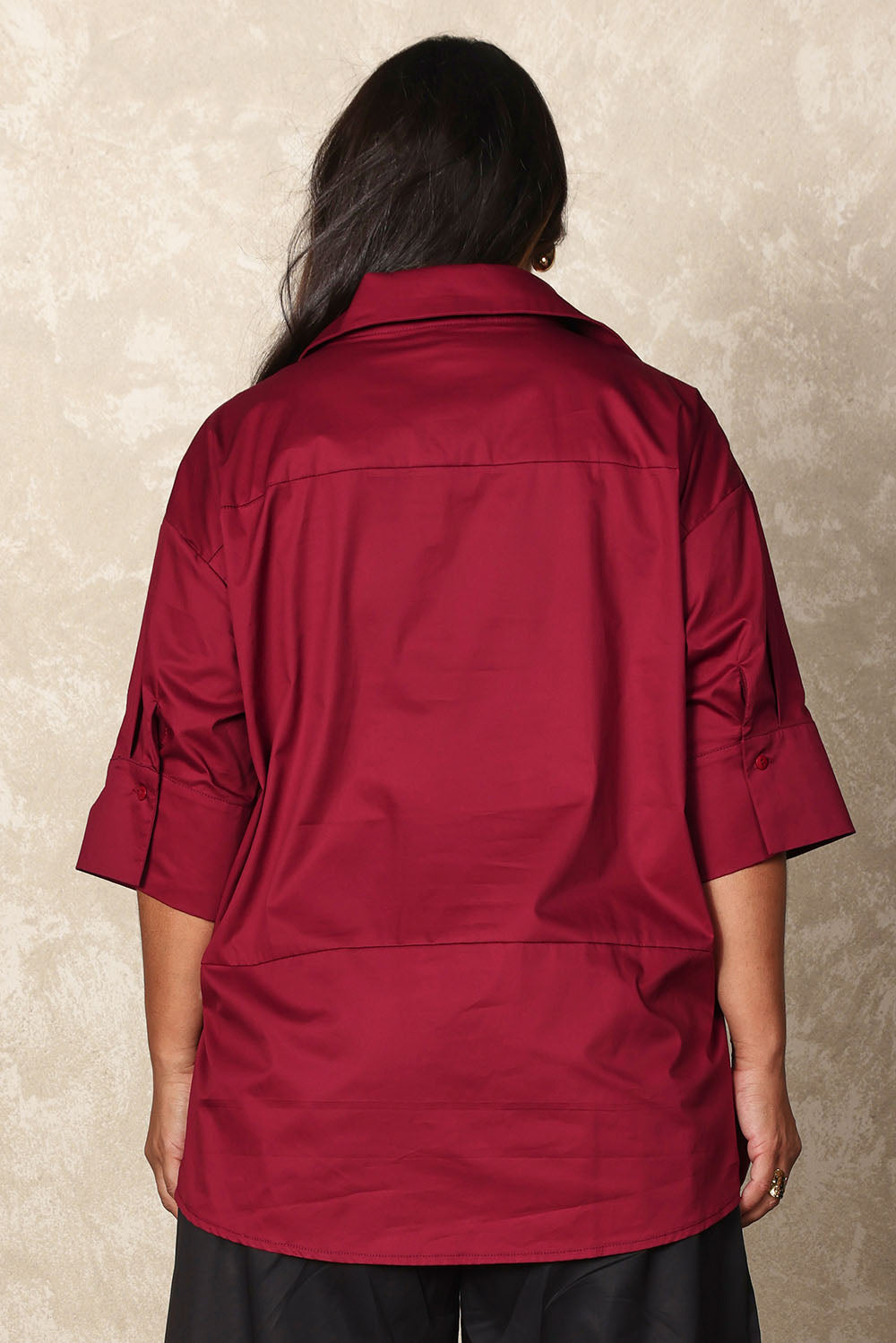 Model Ashleigh wearing size 16 of the Belle Easy Cotton Pop Over Top in colour Chillired (Red), from the back