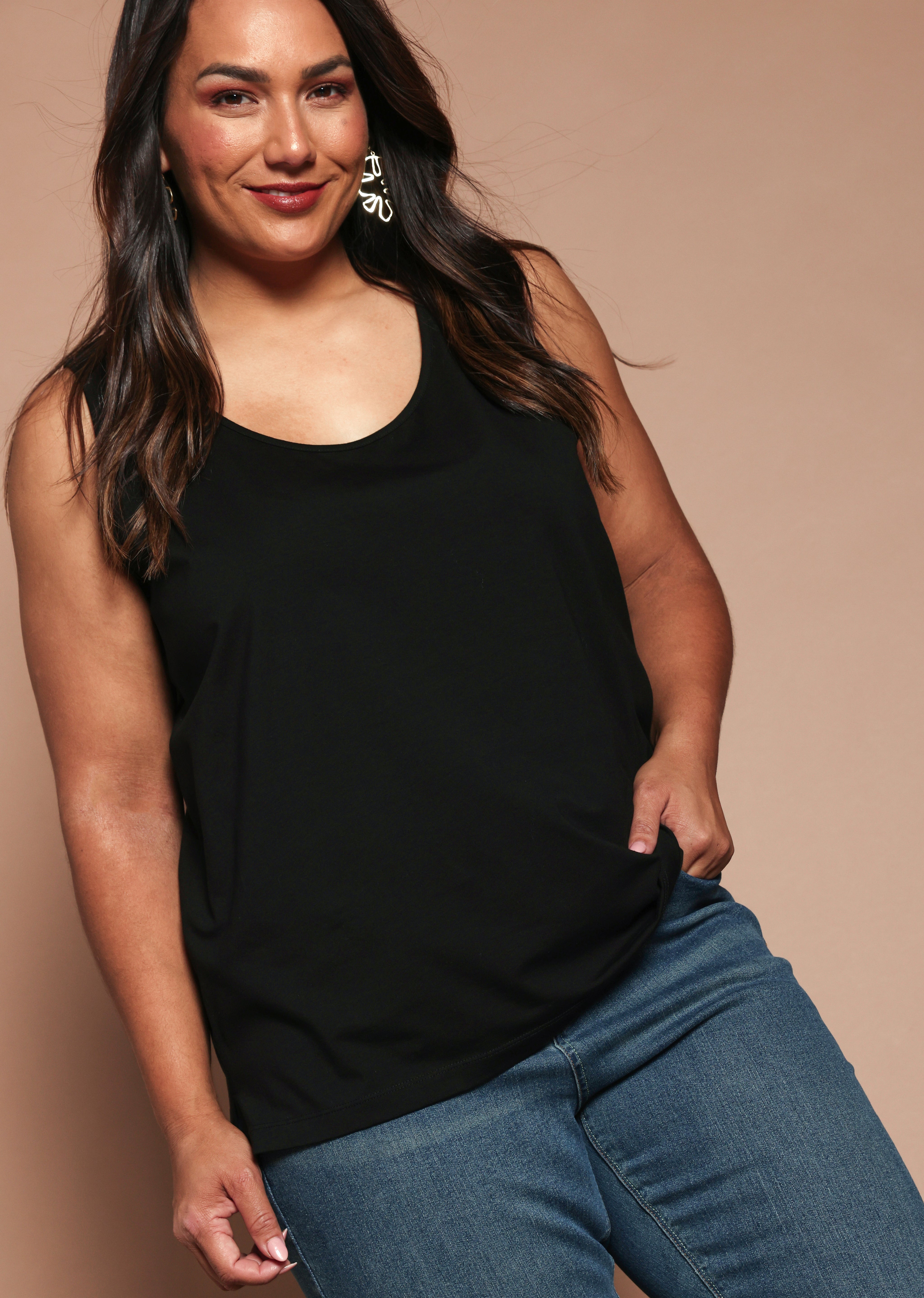 Model Ashleigh wearing size 16 of the Belle Luxe Cotton Tank in colour Black (Black), from the front, showing the whole outfit