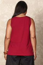 Model Ashleigh wearing size 16 of the Belle Luxe Cotton Tank in colour Chilli (Red), from the back