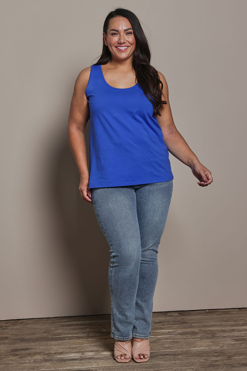 Model Ashleigh wearing size 16 of the Belle Luxe Cotton Tank in colour Seablue (Blue), from the front, showing the whole outfit