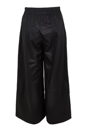 Product shot of the Belle Cotton Palazzo Pant in colour Black (Black), from the back