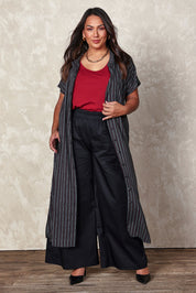 Model Ashleigh wearing size 16 of the Belle Striped Cotton Shirtmaker Dress in colour Blackred (Black), from the front, showing the whole outfit