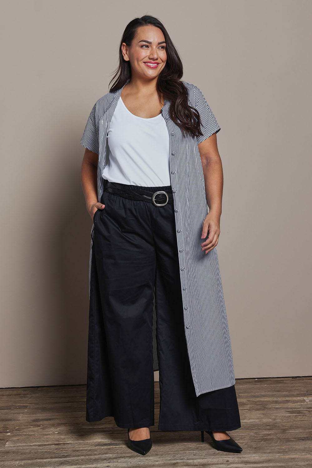 Model Ashleigh wearing size 16 of the Belle Striped Cotton Shirtmaker Dress in colour Blackwhite (Black), from the front, showing the whole outfit