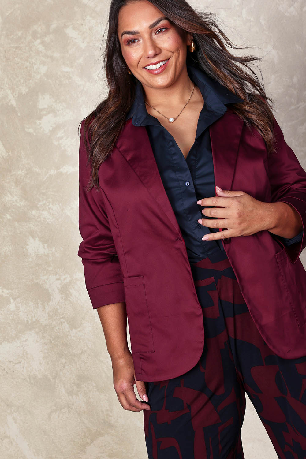 Model Ashleigh wearing size 16 of the Belle Cotton Comfort Blazer in colour Burgundy (Purple), from the front, showing the whole outfit
