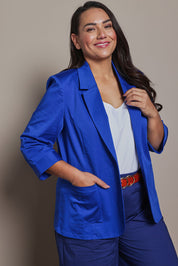 Model Ashleigh wearing size 16 of the Belle Cotton Comfort Blazer in colour Frenchblue (Blue), from the front, cropped image