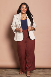 Model Ashleigh wearing size 16 of the Belle Cotton Comfort Blazer in colour Stone, from the front, showing the whole outfit