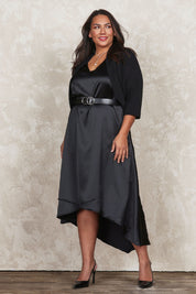 Model Ashleigh wearing size 16 of the Belle Comfort Shrug in colour Black (Black), from the front, showing the whole outfit