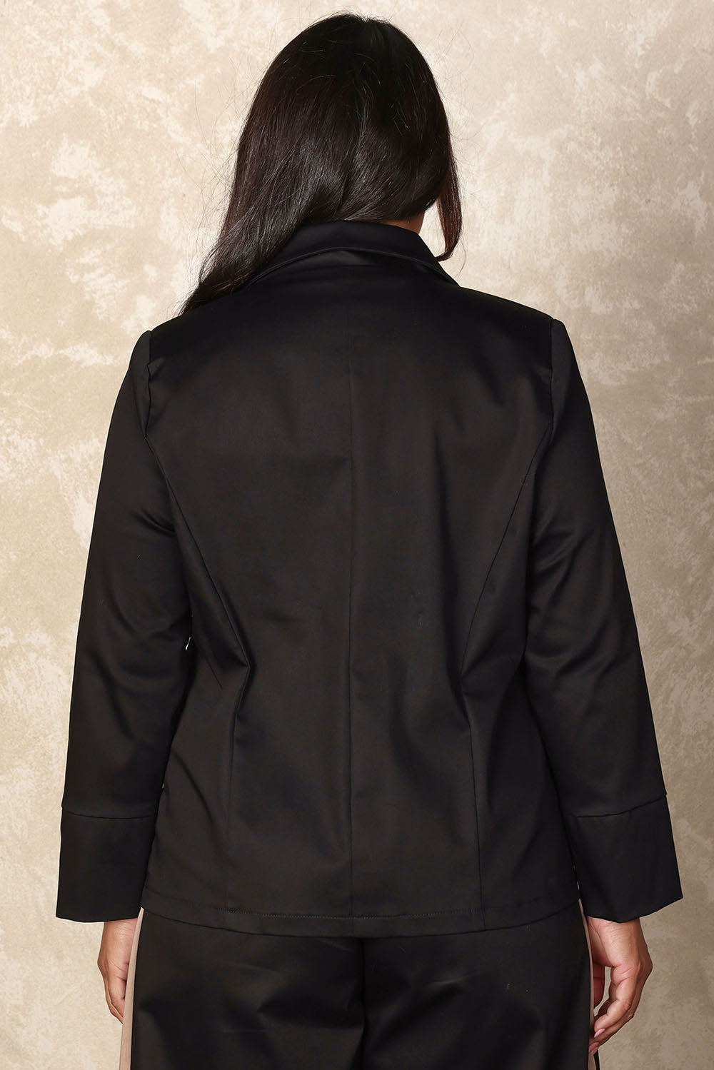 Model Ashleigh wearing size 16 of the Belle Button Up Cotton Stretch  Blazer in colour Black (Black), from the back