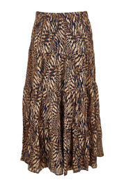 Product shot of the Belle Pull On Printed Tiered Skirt in colour Blacksand (Black), from the back