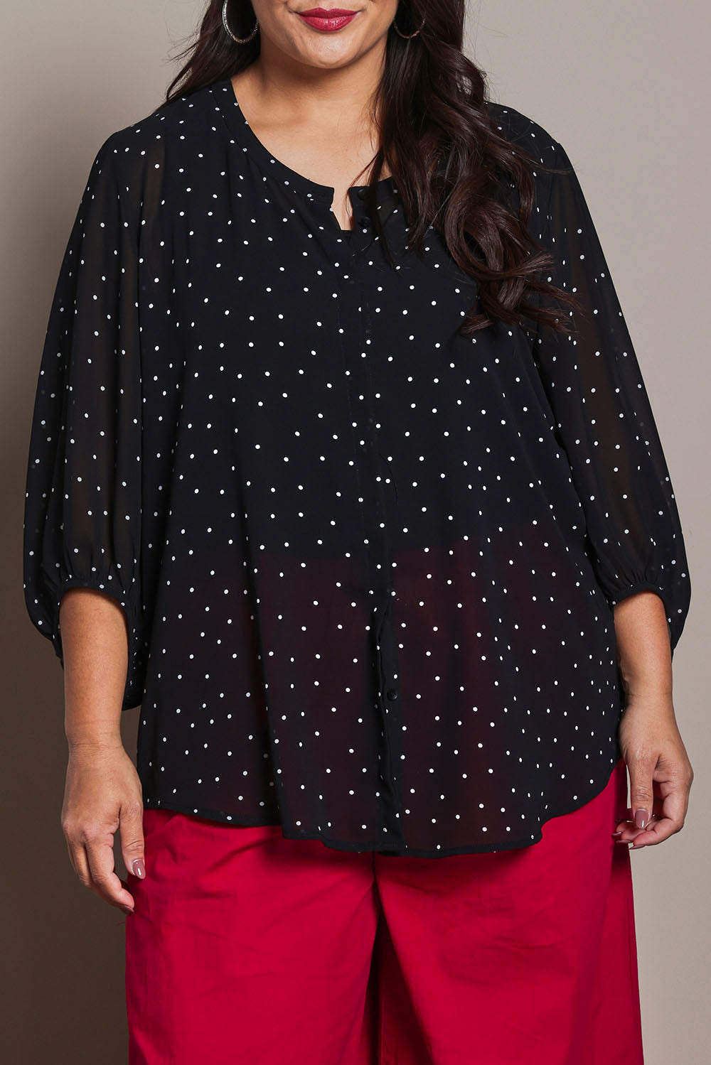 Model Ashleigh wearing size 16 of the Belle Printed Full Sleeve Shirt in colour Blackwhite (Black), from the front, cropped image