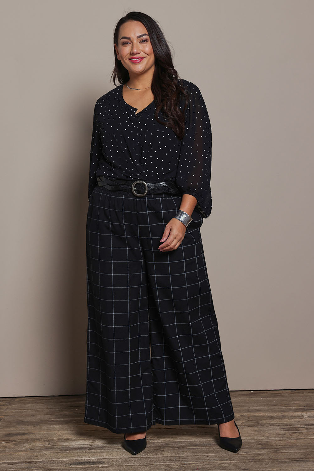 Model Ashleigh wearing size 16 of the Belle Printed Full Sleeve Shirt in colour Blackwhite (Black), from the front, showing the whole outfit