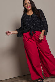 Model Ashleigh wearing size 16 of the Belle Printed Full Sleeve Shirt in colour Blackwhite (Black), from the front, showing the whole outfit
