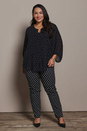 Model Ashleigh wearing size 16 of the Belle Printed Full Sleeve Shirt in colour Blackwhite (Black), from the front, showing the whole outfit