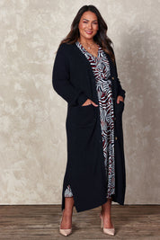 Model Ashleigh wearing size XL of the Belle Cosy Knit Coatigan in colour Navy (Blue), from the front, showing the whole outfit