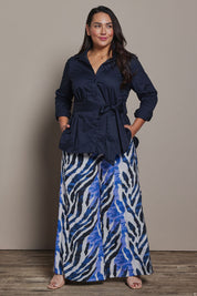 Model Ashleigh wearing size 16 of the Belle Pull On Printed Wide Leg Pant with Pockets in colour Bluezebra (Blue), from the front, showing the whole outfit