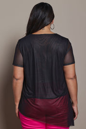Model Ashleigh wearing size 16 of the Belle Printed Mesh Asymmetric Tee in colour Blackfleur (Black), from the back