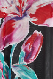 Product shot of the Belle Printed Mesh Asymmetric Tee in colour Blackfleur (Black), detail