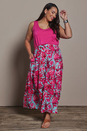Model Ashleigh wearing size 16 of the Belle Printed Pull On Full Skirt with Pockets in colour Aquafusch (Pink), from the front, showing the whole outfit