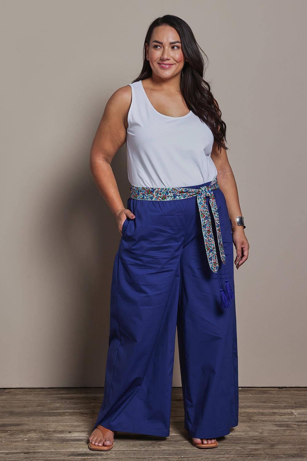 Model Ashleigh wearing size 16 of the Belle Cotton Stretch Palazzo Pant in colour Sapphire (Blue), from the front, showing the whole outfit