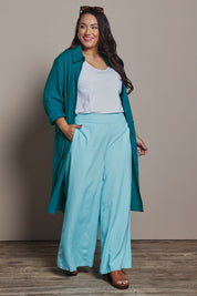 Model Ashleigh wearing size 16 of the Belle 3 Way Linen Blend Shirtmaker Dress in colour Aqua (Blue), from the front, showing the whole outfit