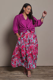 Model Ashleigh wearing size 16 of the Belle Luxe Shirred Sleeve Shirt in colour Magenta (Pink), from the front, showing the whole outfit