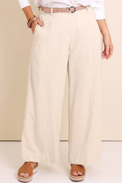 Model Lauraw wearing size 14 of the Belle Wear Anywhere Linen Blend Pants – Sand in colour Sand, in a cropped view
