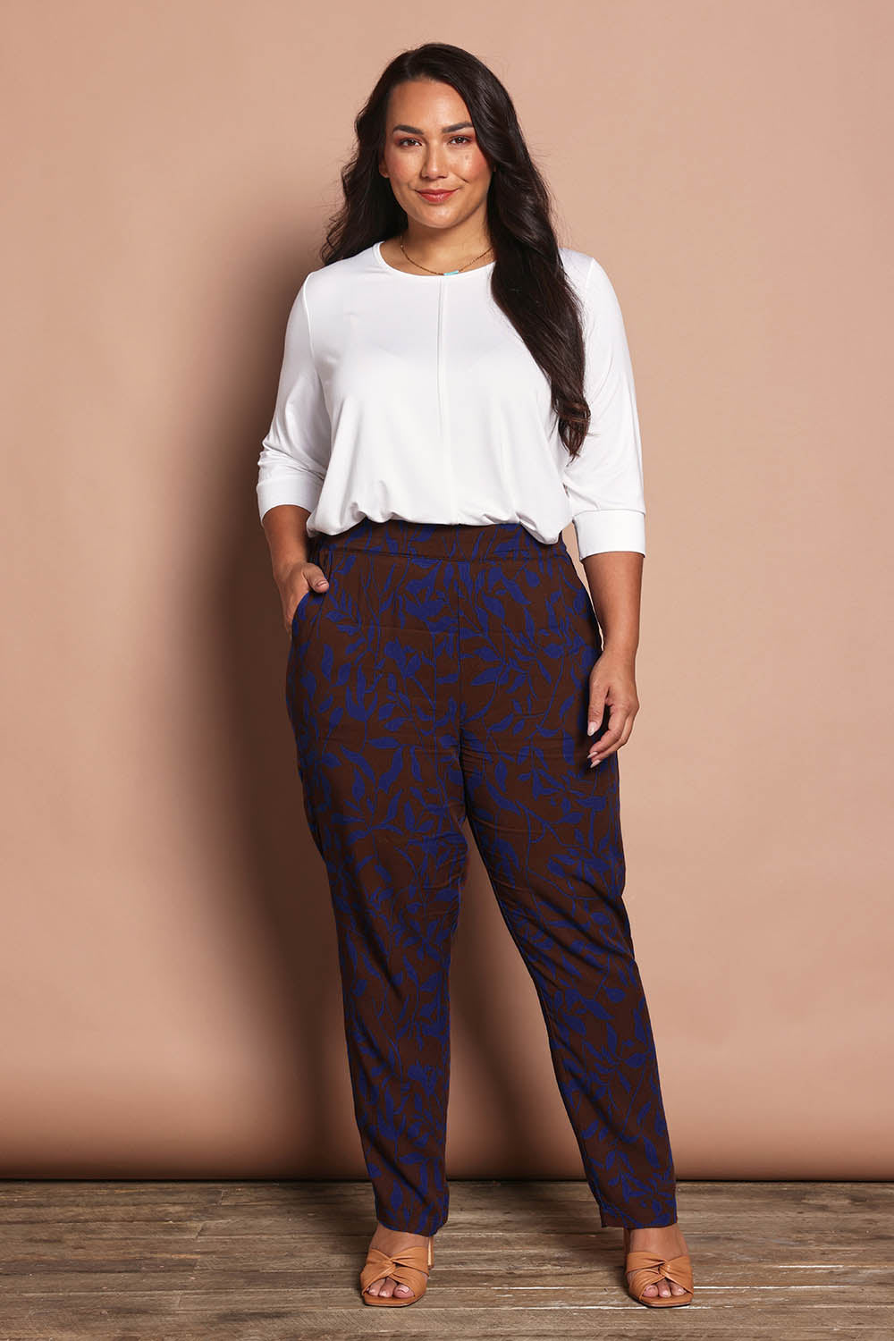 Model Ashleigh wearing size 16 of the Belle Luxe Ecovero Printed Draped Pant in colour Cobaltcoco (Blue), from the front, showing the whole outfit