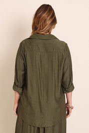 Model Lauraw wearing size 14 of the Belle Easy Wear Every Wear Blouse - Khaki in colour Khaki, from the back