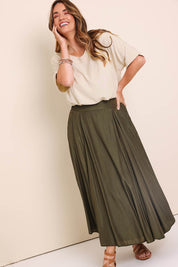 Model Lauraw wearing size 14 of the Belle Wear Anywhere Woven Linen Blend Tee  - Sand in colour Sand, from the front