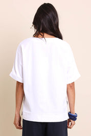 Model Amandam wearing size 10 of the Belle Wear Anywhere Woven Tee  - White in colour White, from the back