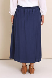 Model Lauraw wearing size 14 of the Belle Easy Wear Every Wear  Skirt  - Navy in colour Navy, from the back