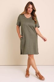 Model Lauraw wearing size 14 of the Belle Easy Wear Linen Dress With Pockets – Olive in colour Olive, from the front