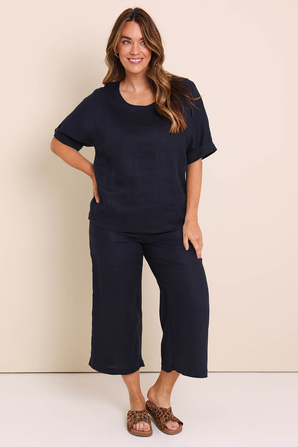 Model Lauraw wearing size 14 of the Belle Easy Wear Linen Scoop Tee – Navy in colour Navy, from the front