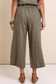Model Amandam wearing size 10 of the Belle Easy Wear Linen Pant – Olive in colour Olive, from the back