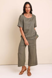 Model Amandam wearing size 10 of the Belle Easy Wear Linen Pant – Olive in colour Olive, from the front