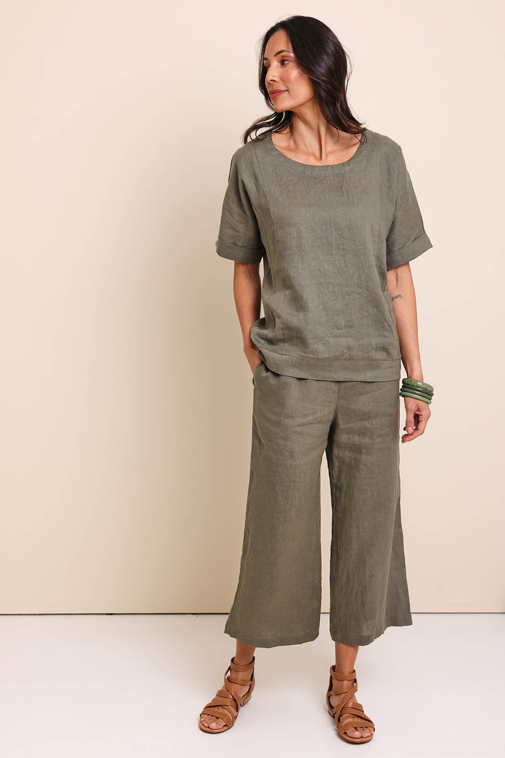 Model Amandam wearing size 10 of the Belle Easy Wear Linen Pant – Olive in colour Olive, from the front