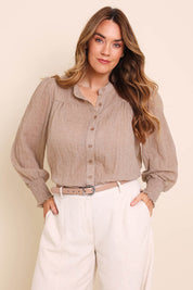 Model Lauraw wearing size 14 of the Belle Shirred Sleeve Shirt – Warmsand in colour Warmsand, in a cropped view