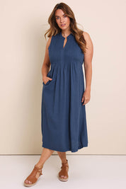 Model Lauraw wearing size 14 of the Belle Pintucked Midi Dress with Pockets - Seablue in colour Seablue, from the front