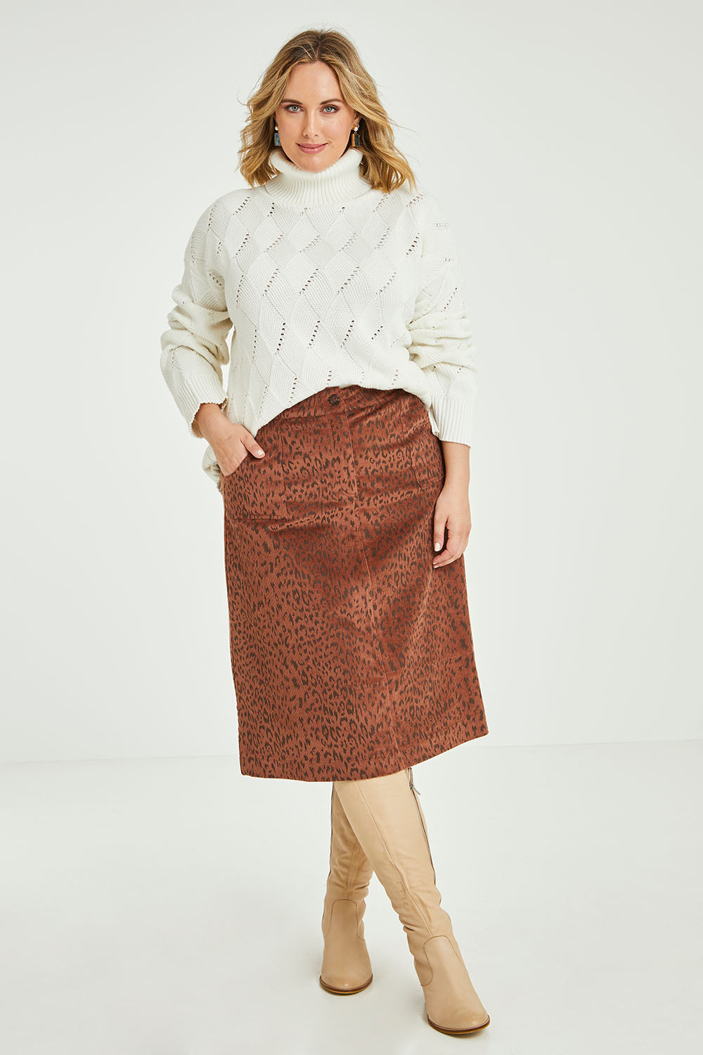 Model Jess wearing size 14 of the Ready For You Cord Skirt in colour Wild, from the front, showing the whole outfit