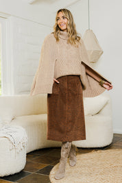 Model Tegan wearing size 10 of the Ready For You Cord Skirt in colour Wild, from the front, showing the whole outfit