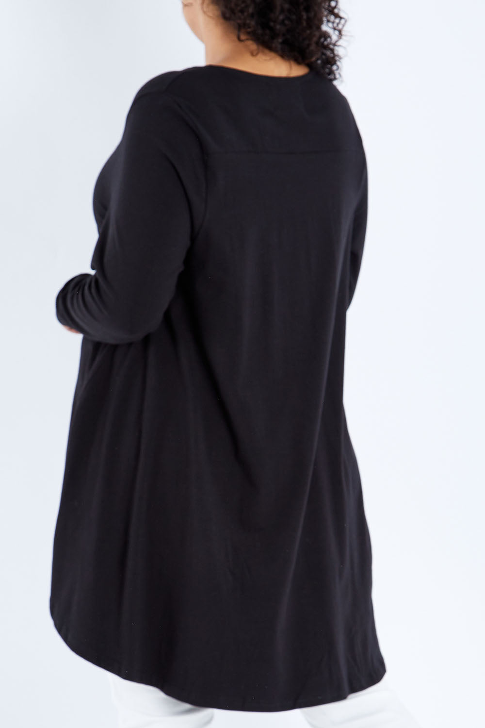Model Sasha-Lee wearing size 16 of the Sunshine In Me Long Sleeve Tee in colour Black (Black), from the back