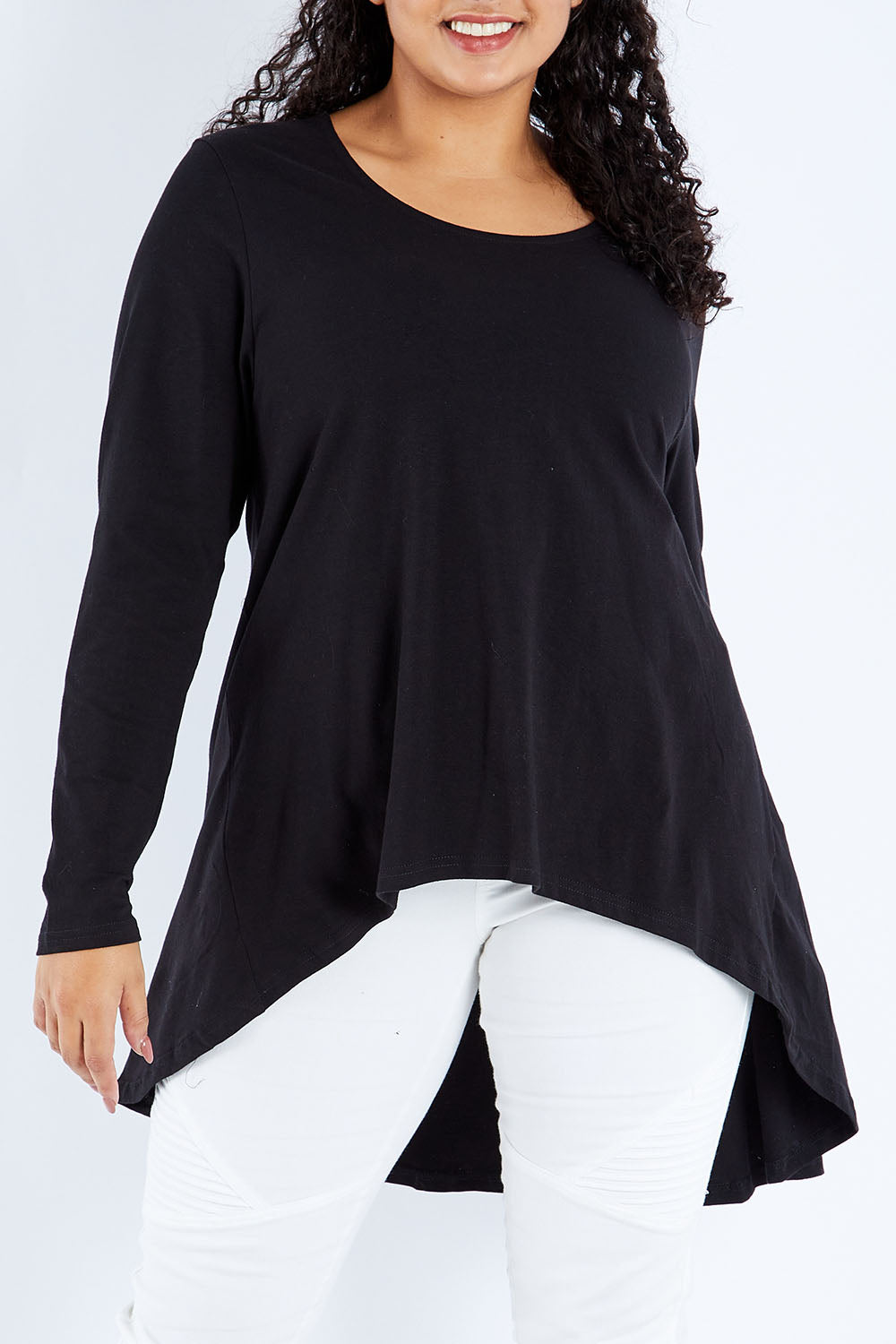 Model Sasha-Lee wearing size 16 of the Sunshine In Me Long Sleeve Tee in colour Black (Black), from the front, cropped image