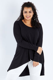 Model Sasha-Lee wearing size 16 of the Sunshine In Me Long Sleeve Tee in colour Black (Black), from the front, cropped image