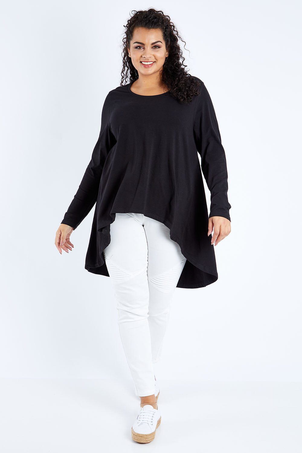 Model Sasha-Lee wearing size 16 of the Sunshine In Me Long Sleeve Tee in colour Black (Black), from the front, showing the whole outfit